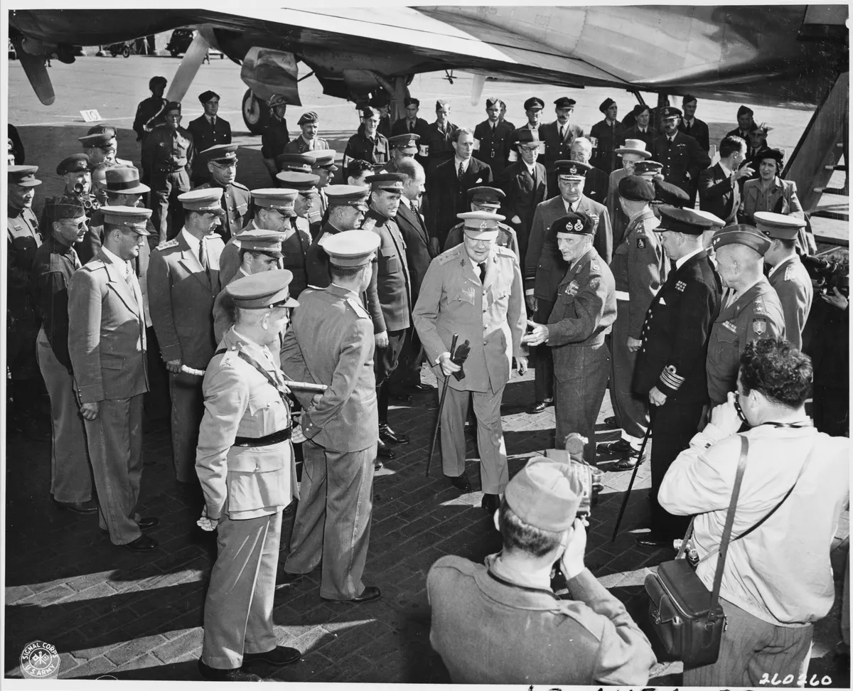 British Prime Minister Winston Churchill is greeted by Field Marshall Bernard Montgomery at Gatow Airport in Berlin... - NARA - 198872
