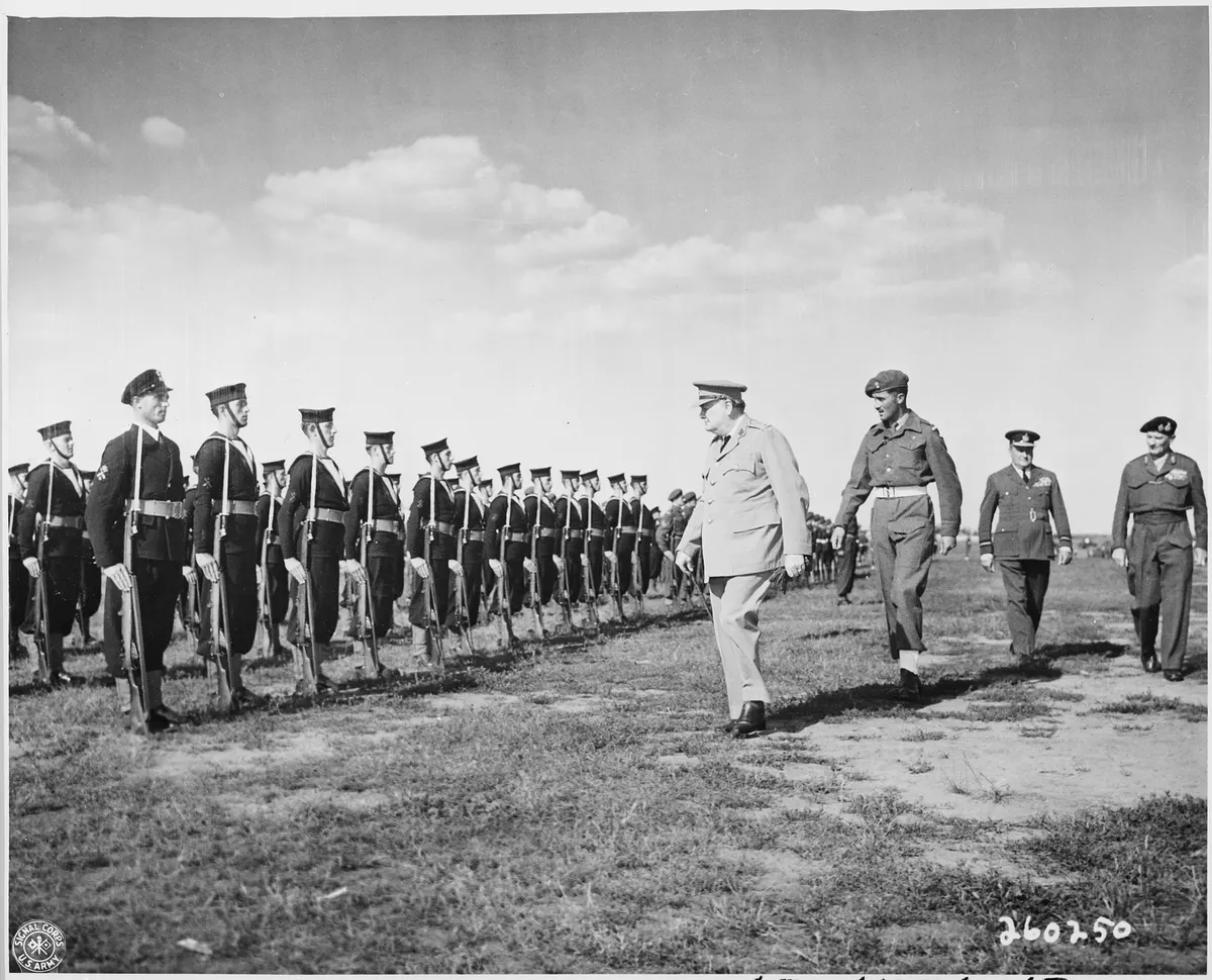 British Prime Minister Winston Churchill reviews honor guard at Gatow Airport in Berlin, Germany where he has just... - NARA - 198862