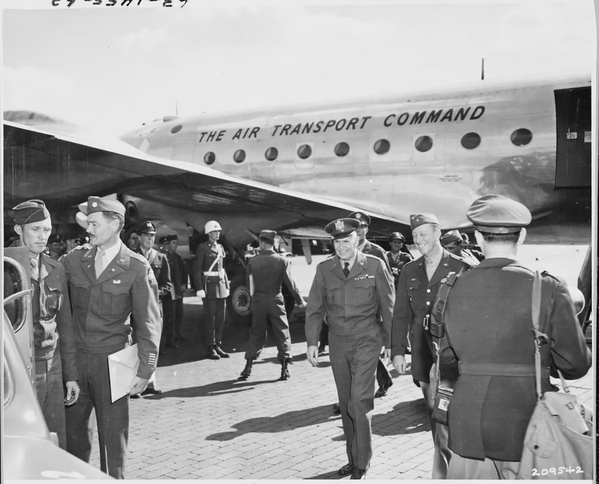 Gen. Brehon B. Somervall, Commanding General, Army Service Forces, center, is escorted to his car by Brig. Gen. Earl... - NARA - 198829