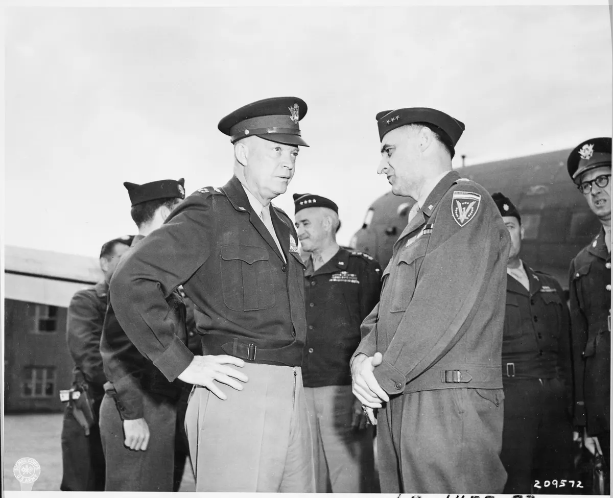 Gen. Dwight D. Eisenhower talks with Lt. Gen. Lucius B. Clay at Gatow Airport in Berlin, Germany during the Potsdam... - NARA - 198840